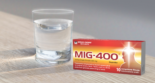 Glas of water and MIG 400® package on the table
